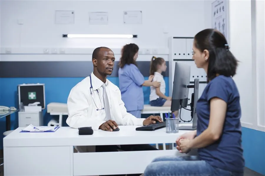 Attorney consulting with a patient in a clinic